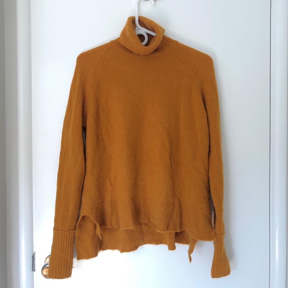 J Crew turtleneck sweater.